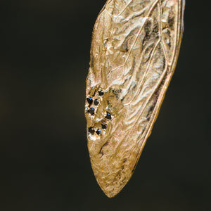 "A wing to set me free": 14K cicada wing pendant