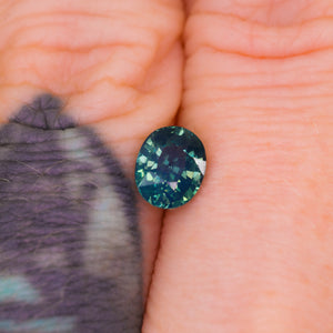Create your own ring: 1.10ct oval opalescent teal sapphire