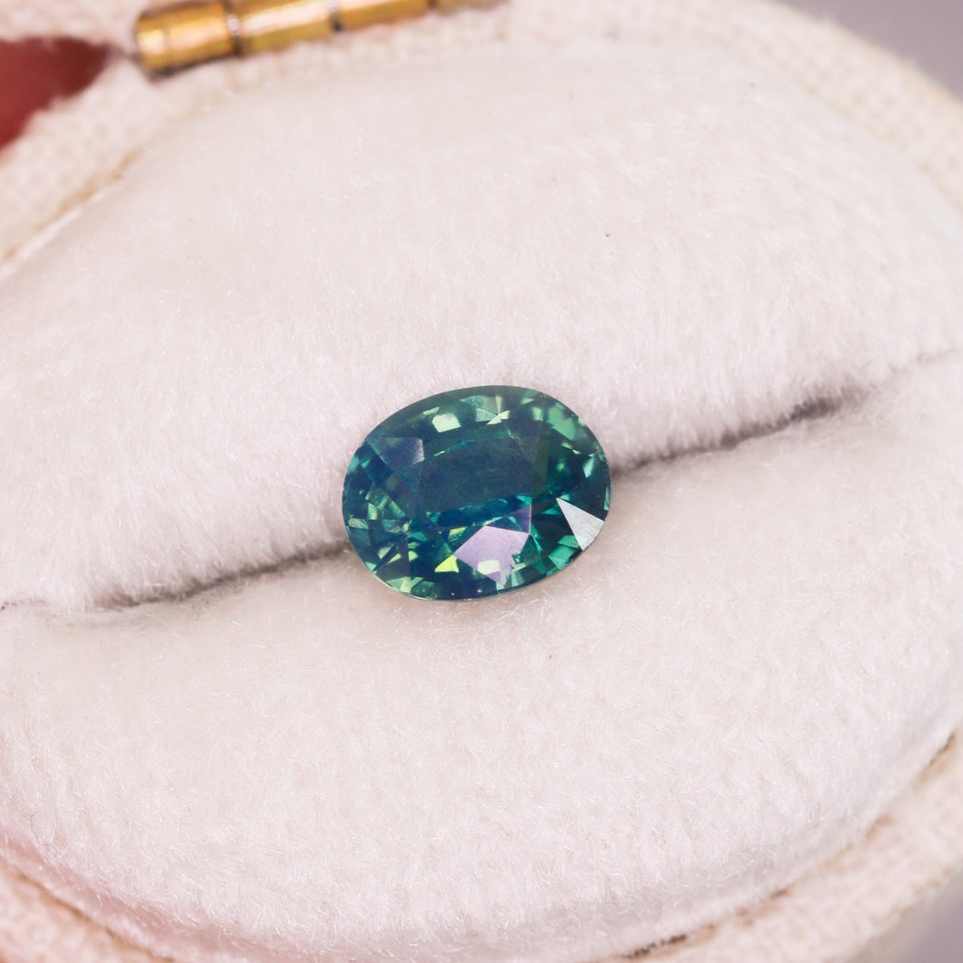 Create your own ring: 1.10ct oval opalescent teal sapphire