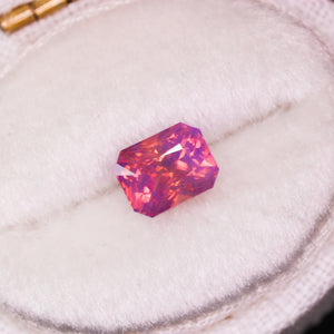 Create your own ring: 1.25ct opalescent pink/orange emerald cut sapphire