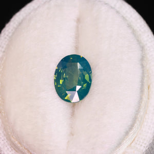 Create your own ring: 1.28ct teal/bicolor opalescent oval sapphire