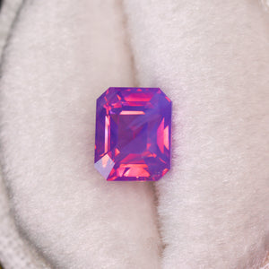 Create your own ring: 1.56ct opalescent pink/purple emerald cut sapphire