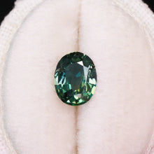 Load image into Gallery viewer, Create your own ring: 1.22ct teal/bicolor oval Madagascar sapphire