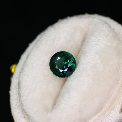 Create your own ring: 0.88ct dark teal round sapphire