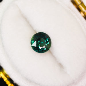 Create your own ring: 0.88ct dark teal round sapphire