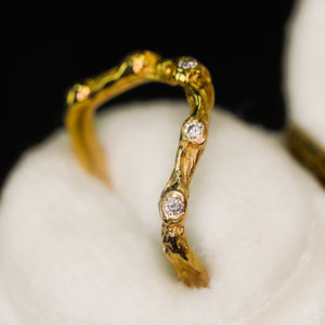 Elven ring: 14K gold arched band with diamonds