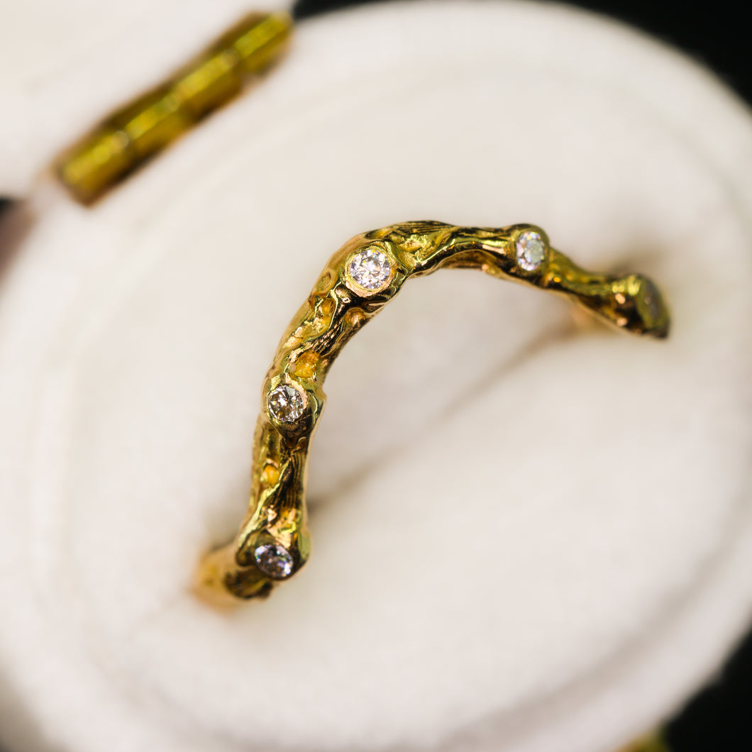 Elven ring: 14K gold arched band with diamonds