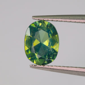 Create your own ring: 0.64ct green oval brilliant cut sapphire