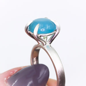 "Mirth": Chalcedony cocktail ring with heavy talon claw prongs (size7; one of a kind)