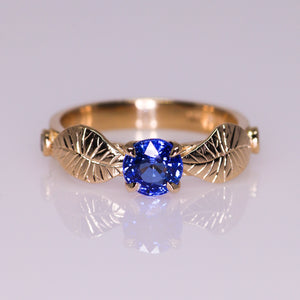 Meadow: 14K yellow gold and vibrant violet-blue sapphire ring