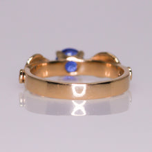 Load image into Gallery viewer, Meadow: 14K yellow gold and vibrant violet-blue sapphire ring