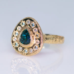 Posy: 14K Madagascar sapphire halo ring (one of a kind)