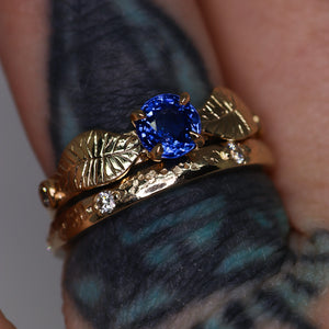 Meadow: 14K yellow gold and vibrant violet-blue sapphire ring