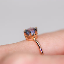 Load image into Gallery viewer, One of a kind and ready to ship: 14K rose gold &amp; pastel blue unheated Umba sapphire (side view of ring gallery on finger)