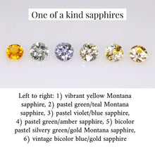 Load image into Gallery viewer, Group photo of the one of a kind sapphires in-stock and available to be made into a Flora design with your choice of 14K gold. From left to right: 1) vibrant yellow Montana sapphire, 2) pastel green/teal Montana sapphire, 3) pastel violet/blue Montana sapphire, 4) pastel green/amber Montana sapphire, 5) bicolor pastel silvery green/gold Montana sapphire, 6) vintage bicolor blue/gold sapphire